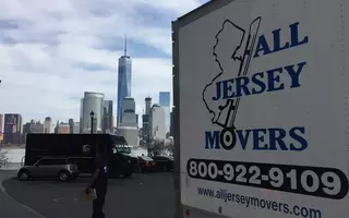 Moving Truck in front of the freedom tower